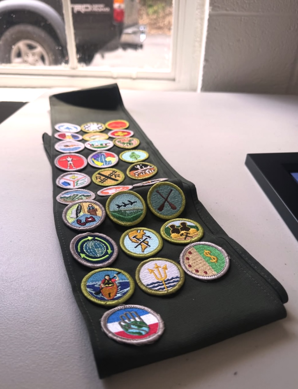 Merit badge sash showing completed merit badges